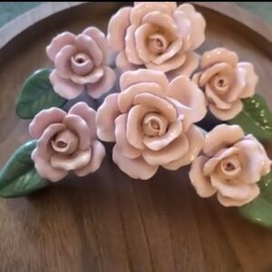 PORCELAIN ROSES ONLY THEY WERE TAKEN OFF OF THE TRAY TO BE USED AS AN ACCENT